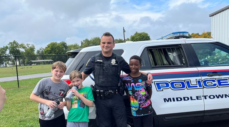 It was a first-ever experiment in encouraging Middletown youth to think about their future careers and it worked, said school officials and parents. On Tuesday Middletown Schools had its students and school families choose among a menu of career or other areas of interest instead of attending classes. Pictured are some Middletown students who visited local police officers for the day. (Provided Photo\Journal-News)