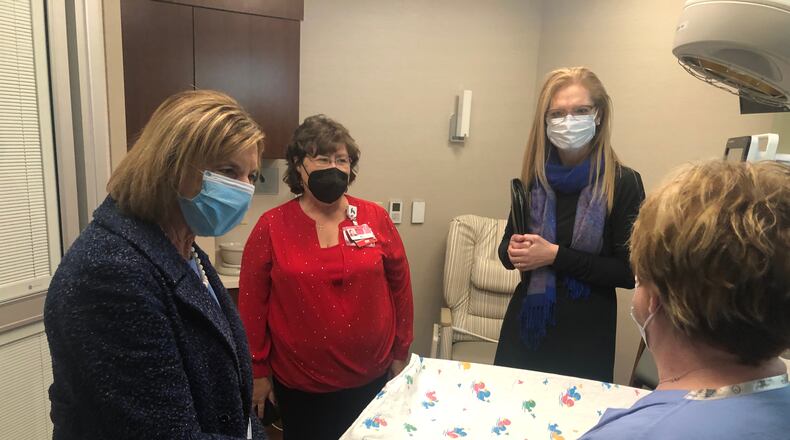 Ohio First Lady Fran DeWine, along with Kettering Health Hamilton officials, toured the Special Care Nursery Monday morning. DeWine also talked about Ohio's Imagination Library. RICK McCRABB/STAFF