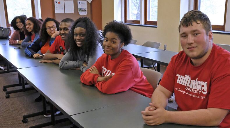 Upward Bound students and alumni gathered in Blair Hall at Wittenberg University to talk about the program and what they think of the federal government rejecting Upward Bound’s grant application because of a typing error. BILL LACKEY/STAFF