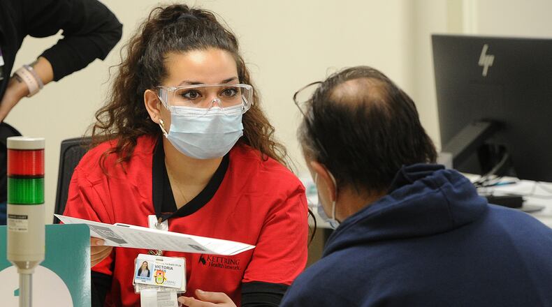 Kettering Health Network, held a COVID-19 vaccine clinic at Greene Memorial Hospital in Xenia, Thursday, March 11, 2021. MARSHALL GORBY\STAFF