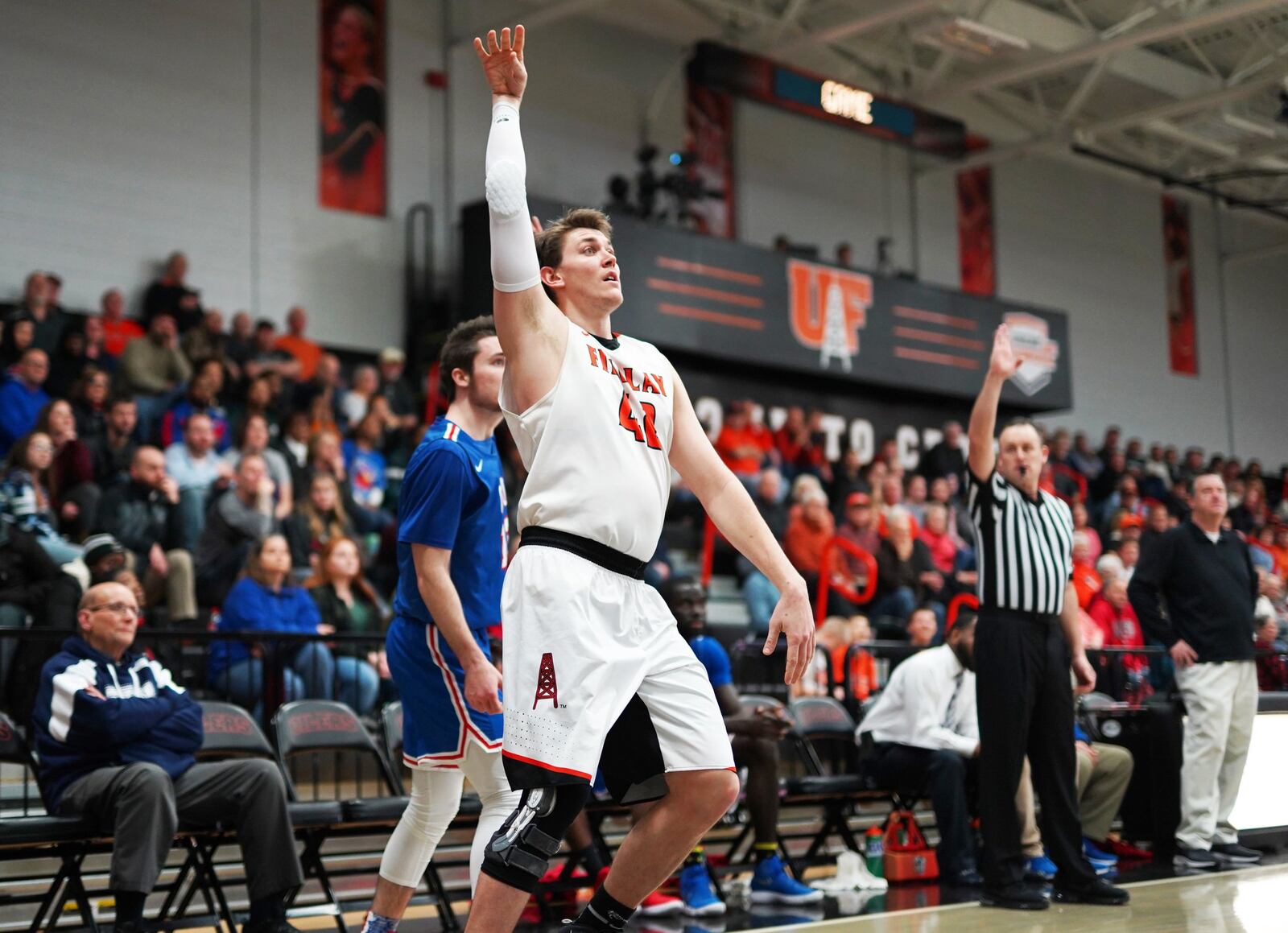 University of Findlay senior Alex White watches one of his shots during a game at Croy Gymnasium in Findlay. The Oilers entered weekend play with a 14-2 record. PHOTO COURTESY OF FINDLAY ATHLETICS