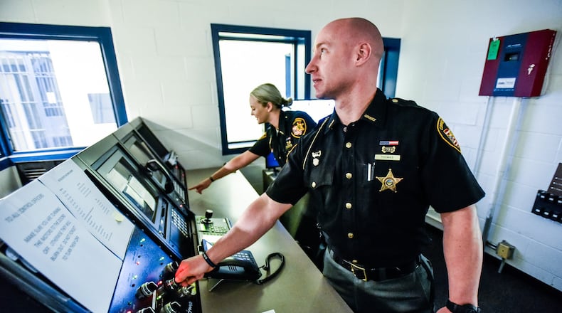 The Butler County commissioners will host their first round of budget hearings Monday. First up is Sheriff Richard Jones who has the largest general fund budget at almost $40 million. Butler County Sheriff’s Office corrections officers Waylon Thomas and Hannah McCarthy stand in the control room of the old Butler County Court Street Jail that was re-opened recently, in part because a new law takes effect July 1 that prohibits judges from sending felony five offenders to prison. Sheriff’s Chief Deputy Tony Dwyer said they also have more contract prisoners than local ones, a situation that requires a careful balancing act between pulling in more revenue for boarding inmates and having to hire more people full-time. One floor of the jail is in operation and another floor is ready for new inmates. NICK GRAHAM/FILE