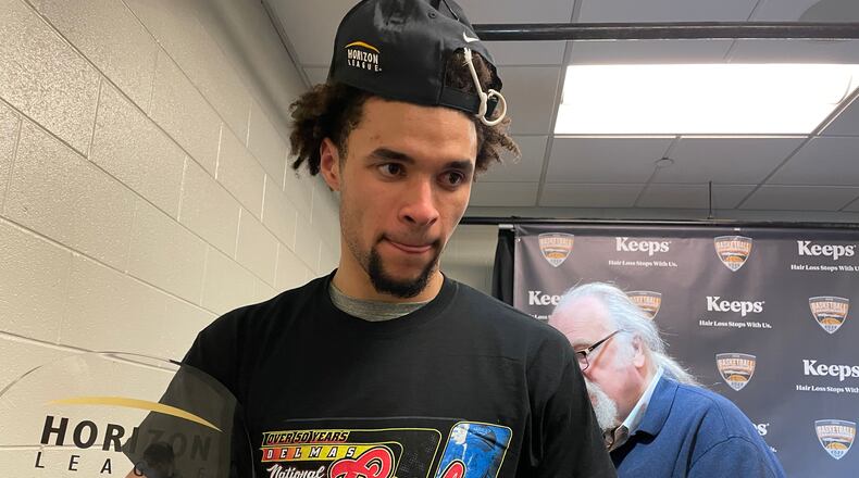 Wright State celebrates winning the 2022 Horizon League Tournament in Indianapolis. (Marcus Hartman/STAFF)