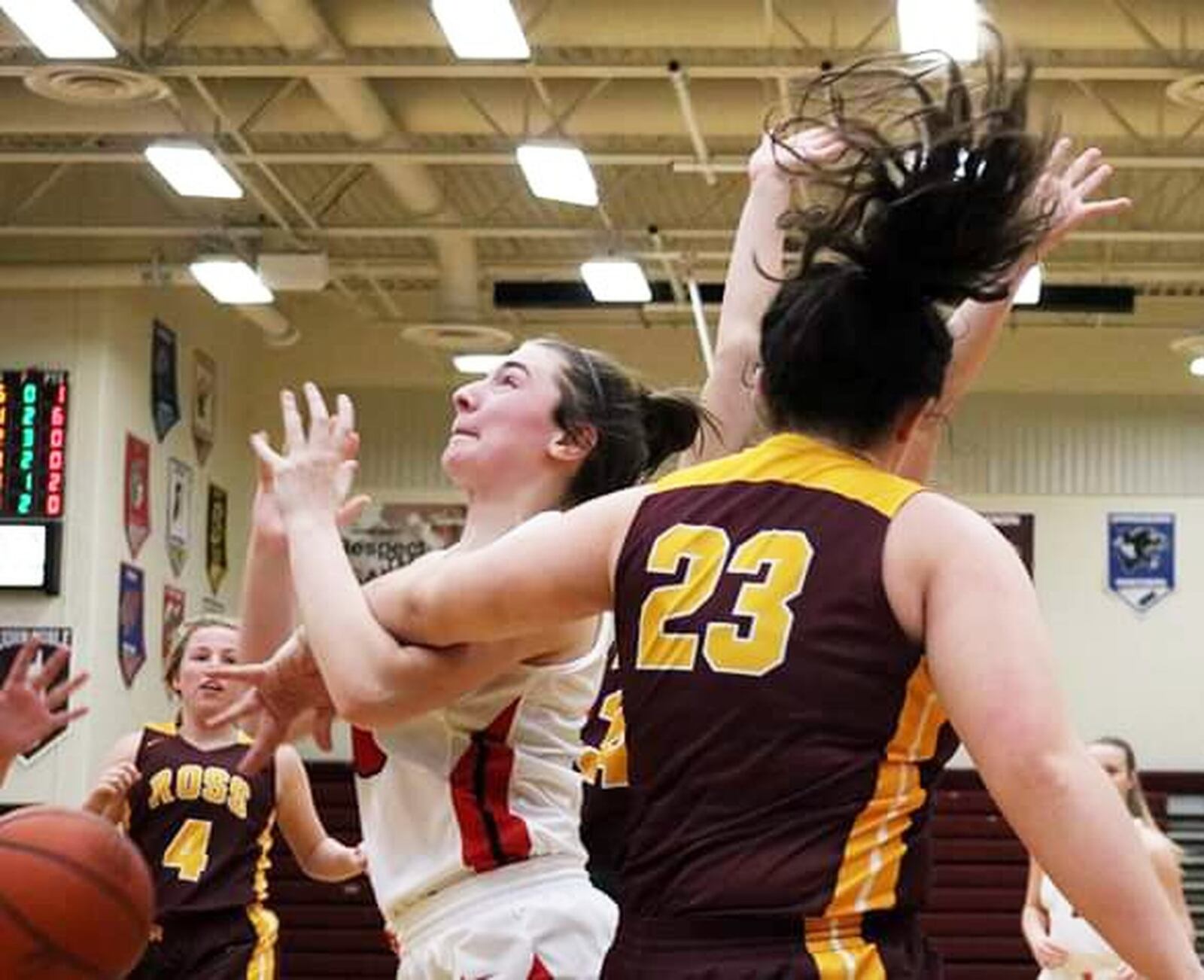 Kellan Romans (23) of Ross fouls Skyler Weir of Franklin during Saturday afternoon’s Division II sectional opener at Lebanon. Franklin won 53-16. CONTRIBUTED PHOTO BY TERRI ADAMS