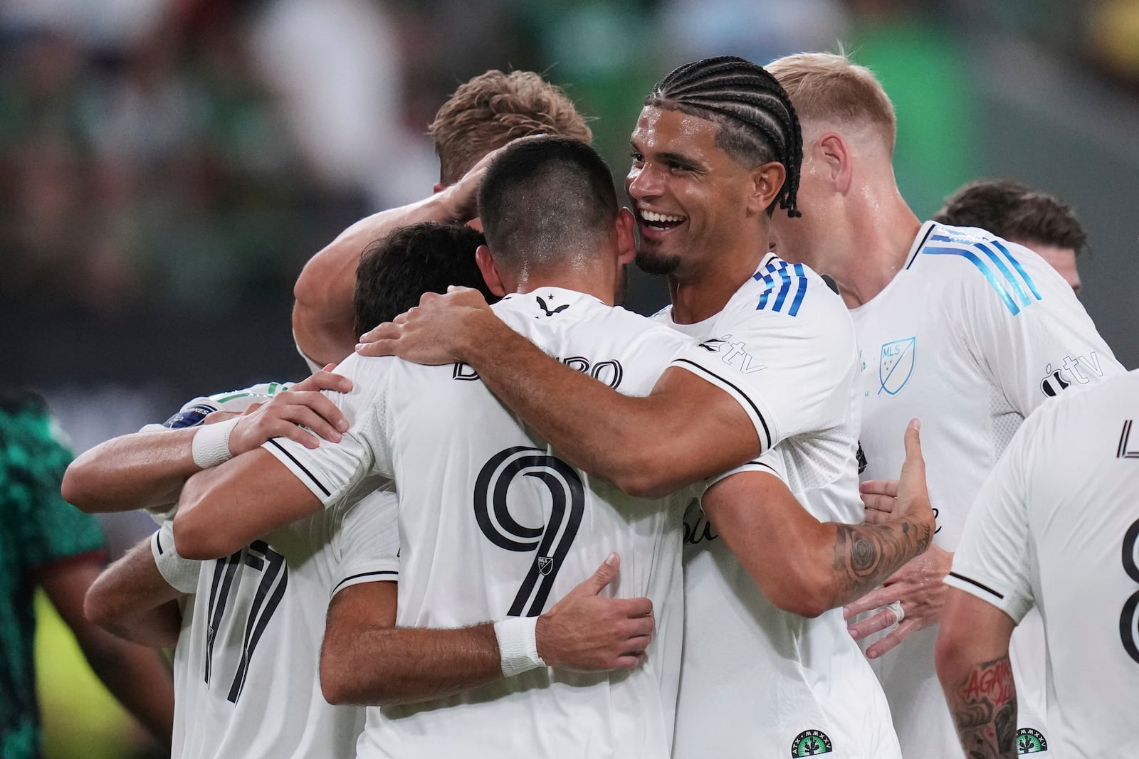 MLS All-Stars' Tai Baribo (9) celebrates with teammates after his goal against Liga MX All-Stars during the MLS All-Star soccer match in Austin, Texas, Wednesday, July 23, 2025. (AP Photo/Eric Gay)