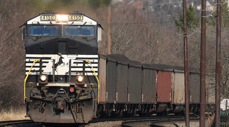 FILE - A Norfolk Southern freight train passes through Homestead, Pa., March 12, 2025. (AP Photo/Gene J. Puskar, File)