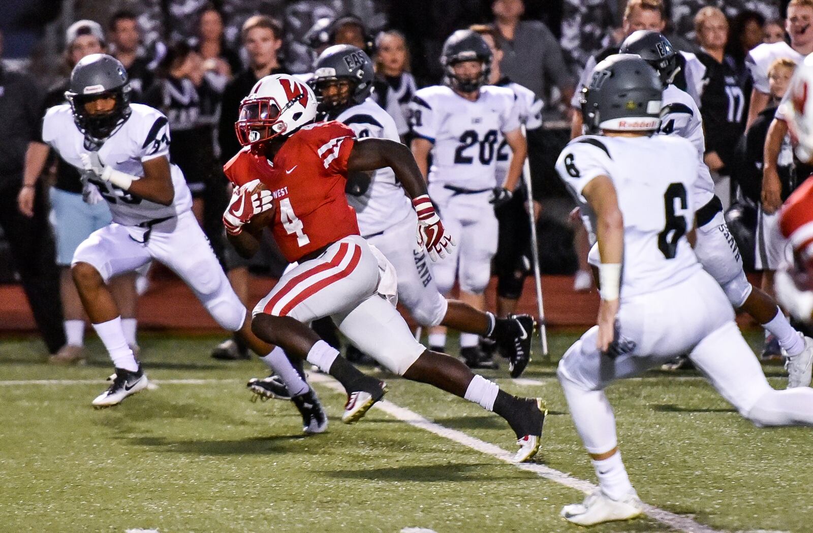 Lakota West’s David Afari carries the ball during a game against Lakota East on Sept. 29 at West. NICK GRAHAM/STAFF