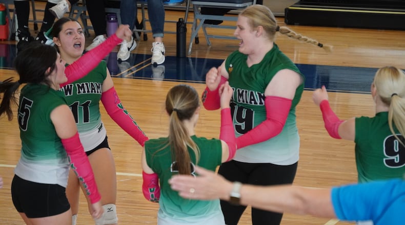 The New Miami girls volleyball team fell to Russia in a Division VII district final on Saturday at Fairborn. CHRIS VOGT / CONTRIBUTED