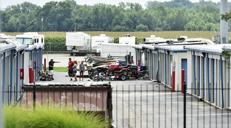 Fire units from throughout the county assisted Fairfield Township Tuesday night for a fire the damaged a large storage building at Advantage Self Storage on Tylersville Road. NICK GRAHAM/STAFF