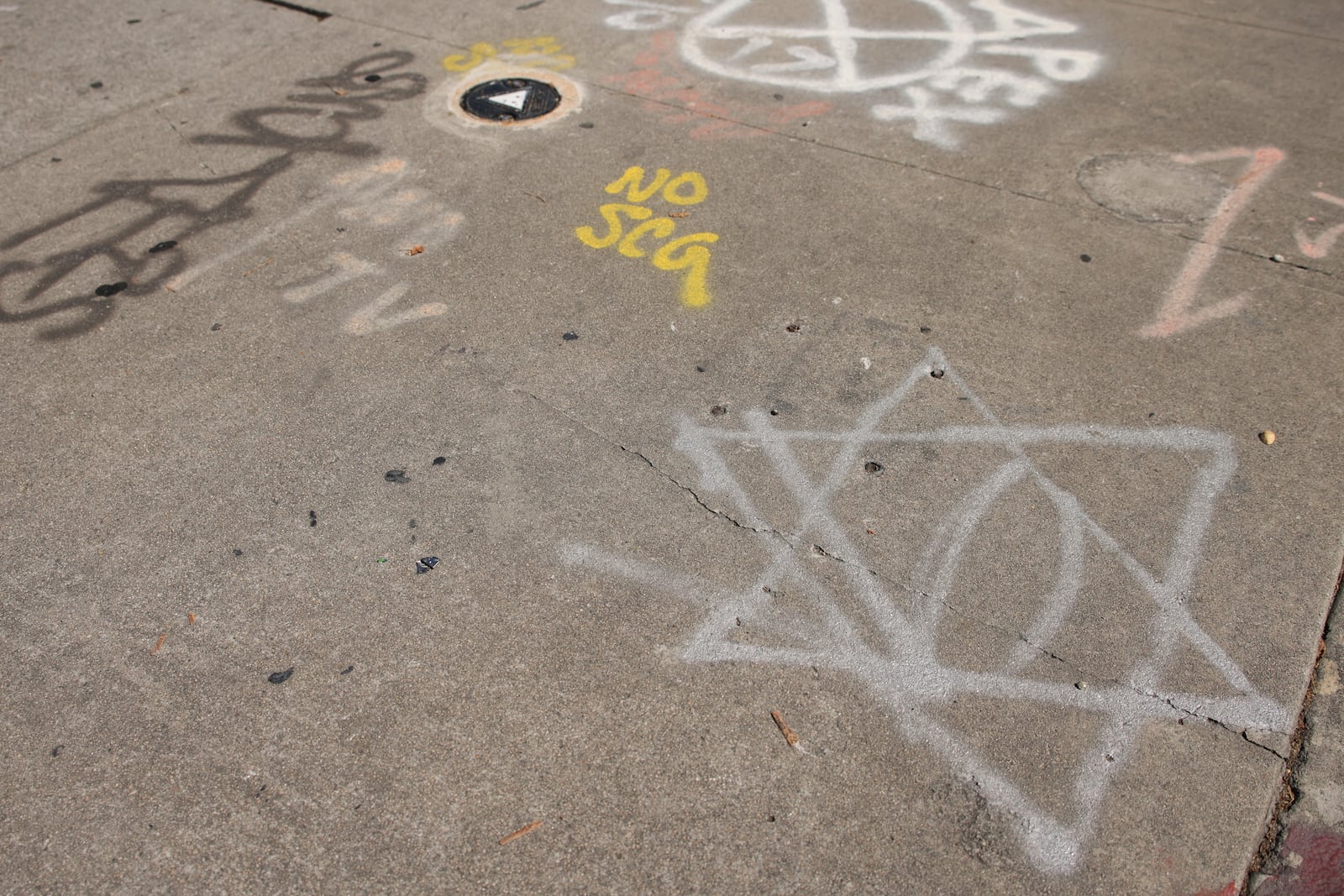 Graffiti is seen on the ground near the Islamic Center of Southern California on June 16, 2025, in Los Angeles. (AP Photo/Jessie Alcheh)