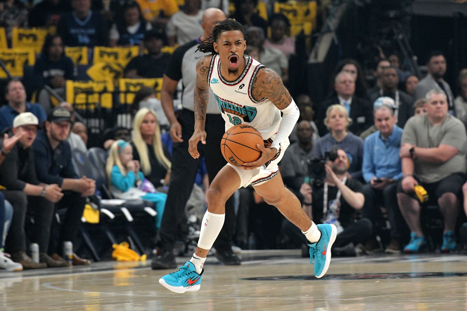 Memphis Grizzlies guard Ja Morant (12) reacts in the first half of Game 3 of an NBA first-round playoff series against the Oklahoma City Thunder, Thursday, April 24, 2025, in Memphis, Tenn. (AP Photo/Brandon Dill)