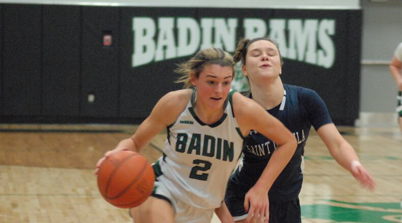 Badin's Braelyn Even (2) drives past a St. Ursula defender on Saturday night at Mulcahey Gym. Chris Vogt/CONTRIBUTED