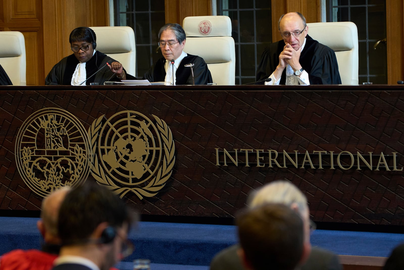 Presiding judge Yuji Iwasawa opens the International Court of Justice hearings into a United Nations request for an advisory opinion on Israel's obligations to allow humanitarian assistance in Gaza and the West Bank, in The Hague, Netherlands, Monday, April 28, 2025. (AP Photo/Peter Dejong)