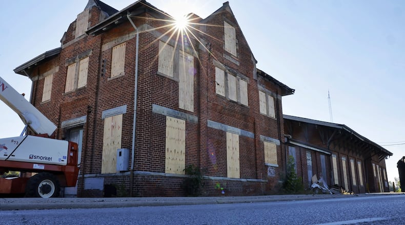 The city of Hamilton expects the former CSX train depot on Martin Luther King Jr. Boulevard could move as early as early November north a few hundred feet to the corner of Maple Street and MLK Jr. Boulevard. NICK GRAHAM/STAFF