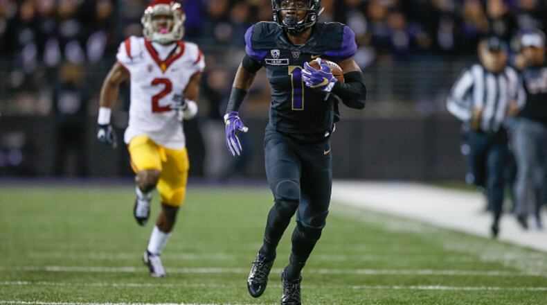 SEATTLE, WA - NOVEMBER 12: Wide receiver John Ross #1 of the Washington Huskies rushes for a touchdown against the USC Trojans on November 12, 2016 at Husky Stadium in Seattle, Washington. The Trojans defeated the Huskies 24-13. (Photo by Otto Greule Jr/Getty Images)