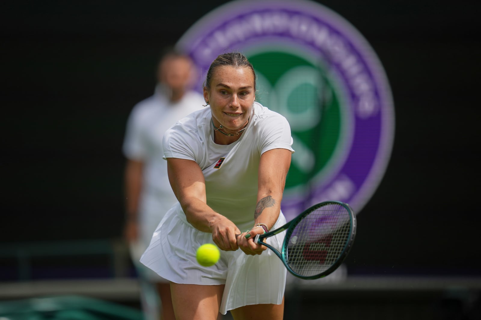 Aryna Sabalenka of Belarus plays a return to Coco Gauff of United States during a practice session ahead of the Wimbledon Championships in London, Friday, June 27, 2025. (AP Photo/Kin Cheung)