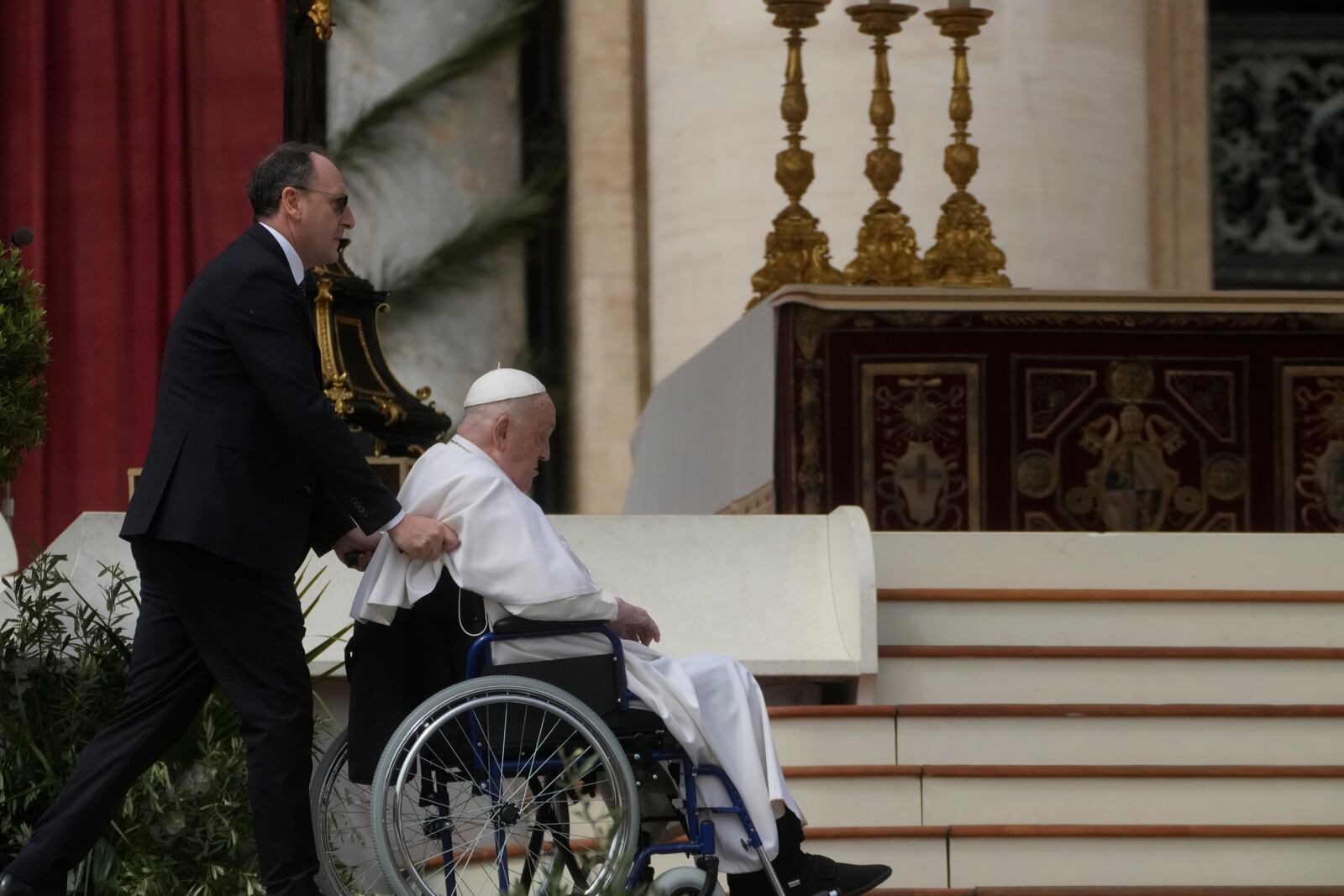 Pope Francis arrives at the end of the mass on Palm Sunday in St. Peter's Square at The Vatican, Sunday, April 13, 2025. (AP Photo/Gregorio Borgia)