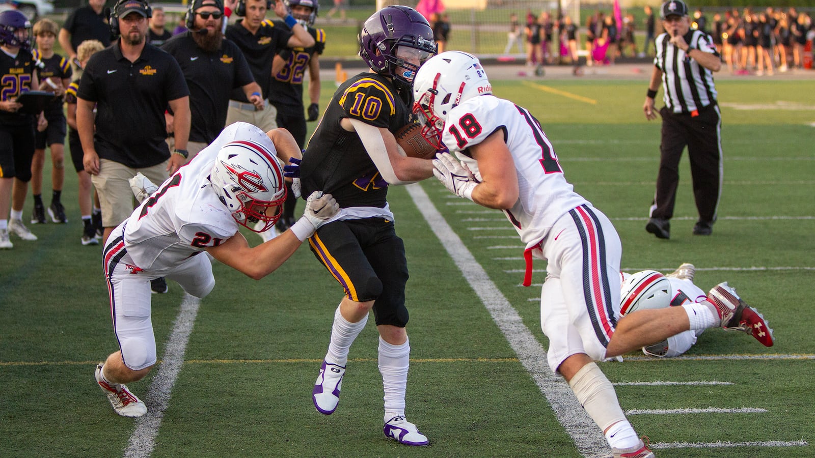 Tippecanoe hits Bellbrook's Vincent Epifano late out of bounds during Friday night's 21-7 Bellbrook win in Bellbrook. Jeff Gilbert/CONTRIBUTED