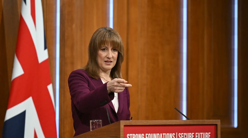 Britain's Chancellor of the Exchequer Rachel Reeves takes journalists' questions after delivering a speech in the media briefing room of 9 Downing Street, London, Tuesday Nov. 4, 2025. (Justin Tallis/Pool Photo via AP)