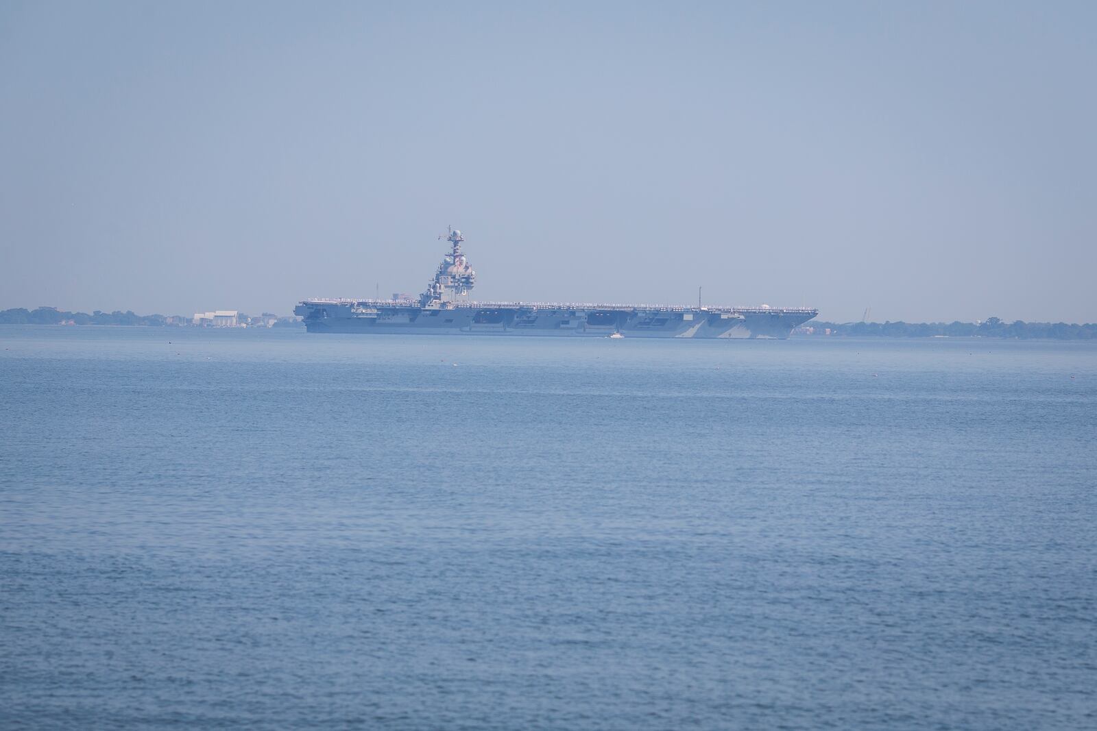 The USS Gerald R. Ford aircraft carrier leaves Naval Station Norfolk, Tuesday, June 24, 2025, in Norfolk, Va. (AP Photo/John Clark)