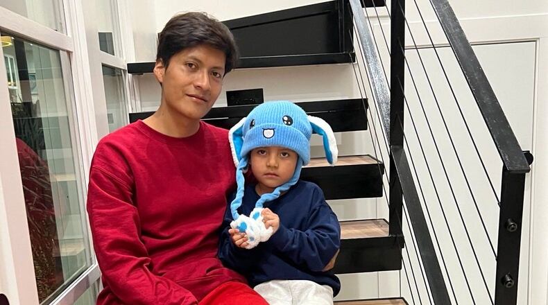 In this photo released by U.S. Rep. Joaquin Castro, D-TX, Adrian Conejo Arias and his son, five-year-old Liam Conejo Ramos are seen in San Antonio, Texas, Saturday, Jan. 31, 2026, after being released from Dilley detention center. (Joaquin Castro via AP)