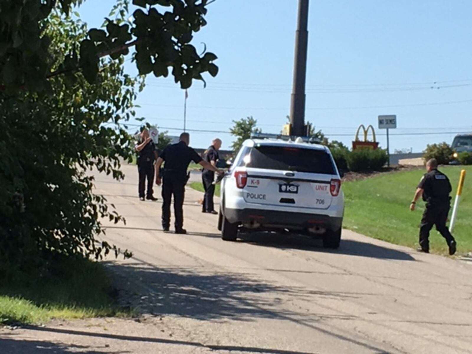 Two people have been taken into custody following a bank robbery this morning in Monroe.