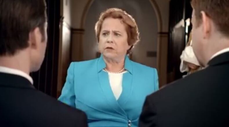 A commercial director posts a "spec" ad for Tide To Go that features a same-sex couple about to get married and a woman who they think are about to stop them, poking fun at the recent issue surrounding same-sex marriage and the embattled Rowan County, Kentucky clerk Kim Davis. (Facebook.com/Mark Nickelsburg)