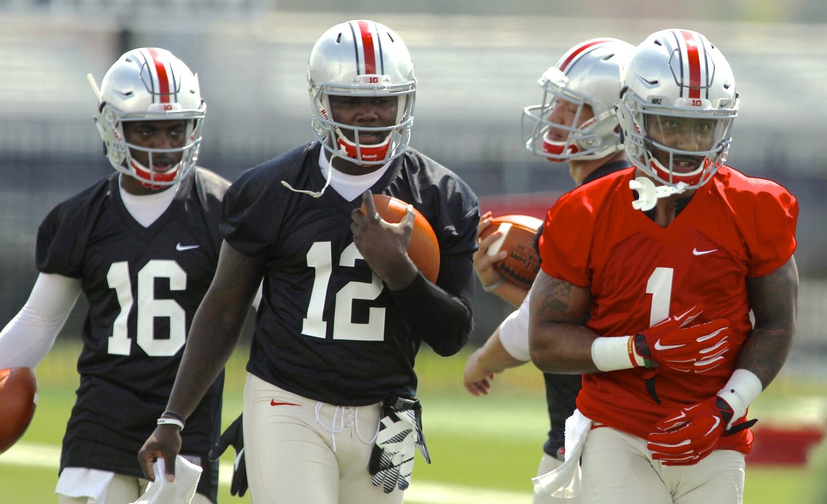 Meyer won’t name QB starter until day of Ohio State opener