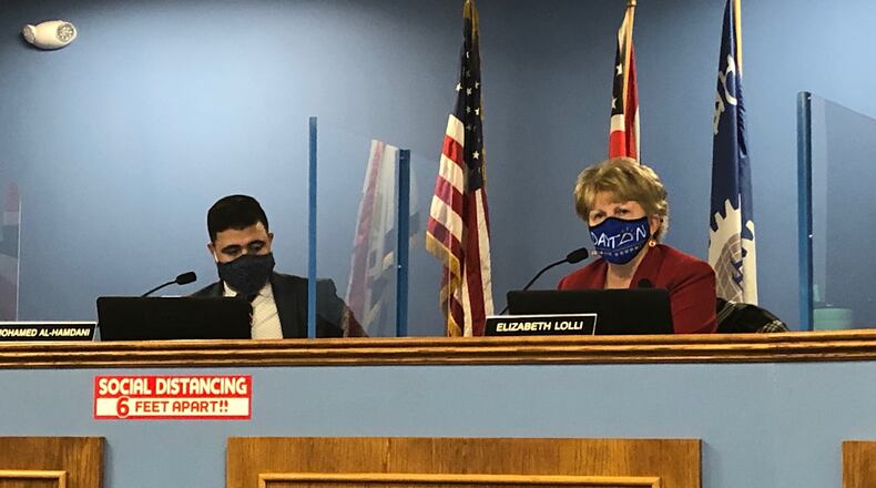 Dayton Public Schools Superintendent Elizabeth Lolli speaks at the Oct. 20 school board meeting, as board President Mohamed Al-Hamdani looks on. JEREMY P. KELLEY / STAFF