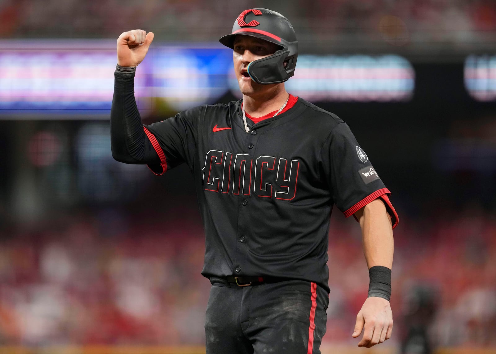 Cincinnati Reds' Austin Hays reacts after hitting a single during the seventh inning of a baseball game against the Tampa Bay Rays, Friday, July 25, 2025, in Cincinnati. (AP Photo/Jeff Dean)