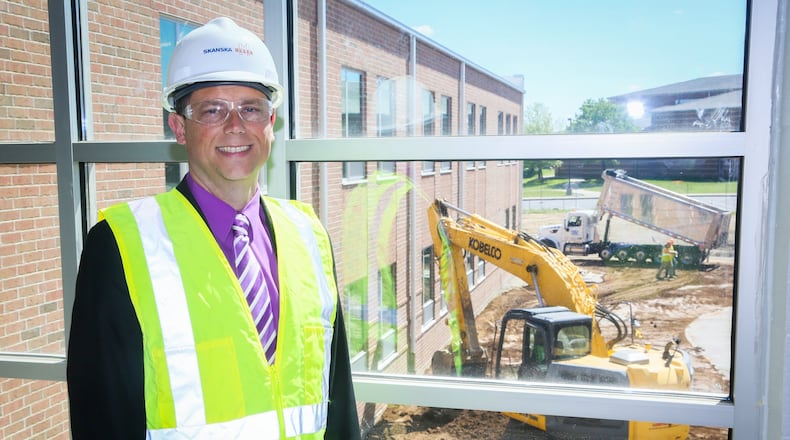 Billy Smith, standing in the new Freshman School under construction, is wrapping up his first year as Superintendent of Fairfield Schools. GREG LYNCH / STAFF