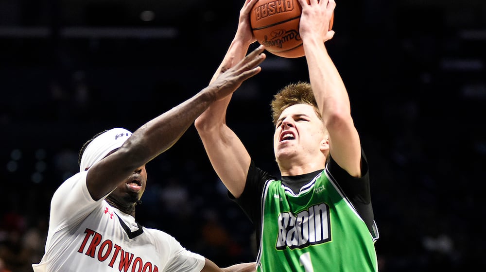 The Trotwood Madison boys basketball team beat Hamilton Badin 54-48 in the Division III, Region 12 championship game on Saturday, March 14, 2026, at Xavier University's Cintas Center. GEOFF NEVILLE / CONTRIBUTED PHOTO