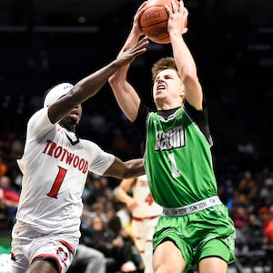 The Trotwood Madison boys basketball team beat Hamilton Badin 54-48 in the Division III, Region 12 championship game on Saturday, March 14, 2026, at Xavier University's Cintas Center. GEOFF NEVILLE / CONTRIBUTED PHOTO