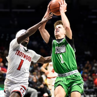 The Trotwood Madison boys basketball team beat Hamilton Badin 54-48 in the Division III, Region 12 championship game on Saturday, March 14, 2026, at Xavier University's Cintas Center. GEOFF NEVILLE / CONTRIBUTED PHOTO