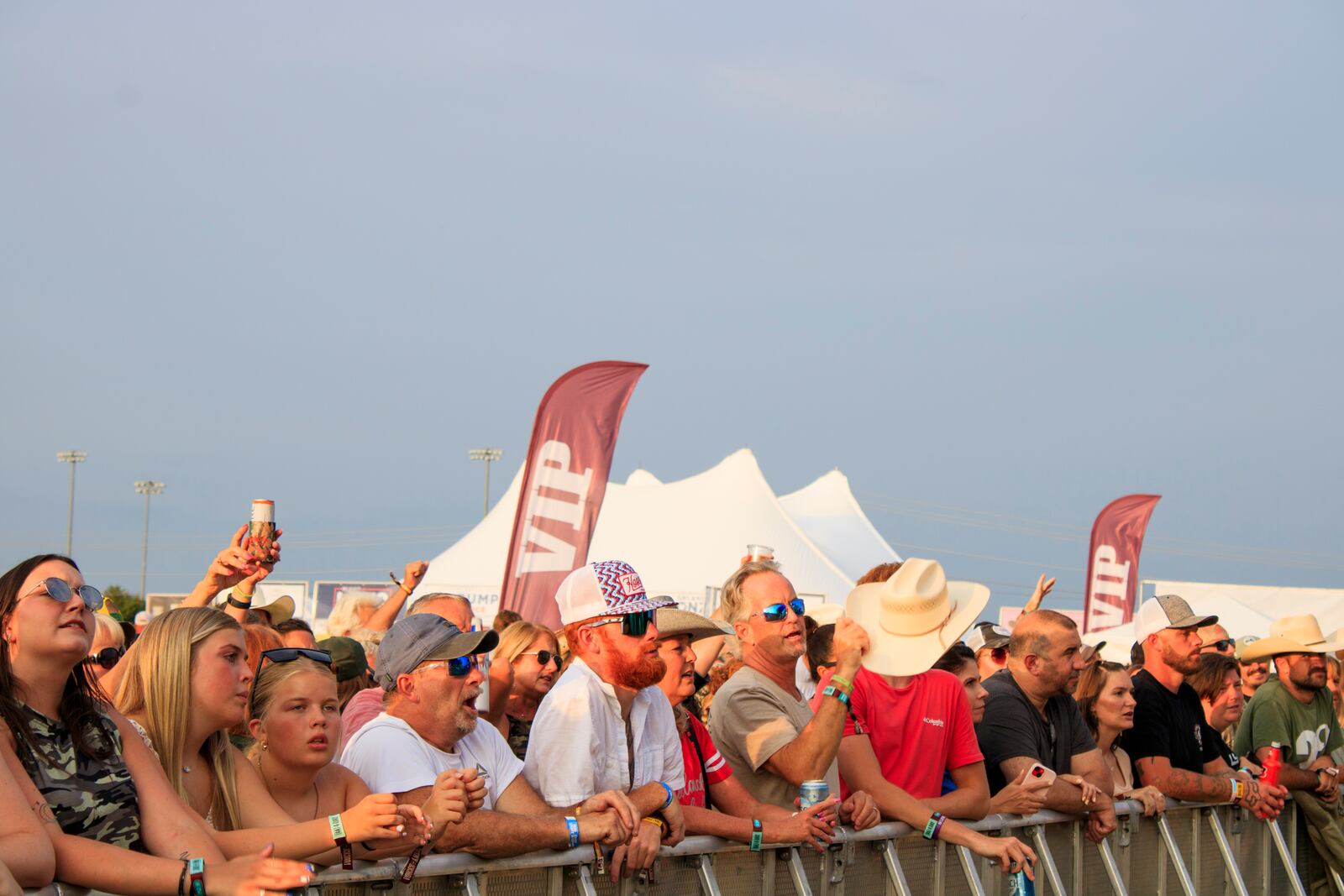 Concert goers attend the first day of the Voices of America Country Music Fest on the grounds of the National Voice of American Museum of Broadcasting Thursday, Aug. 8, 2024 in West Chester Township. KASEY TURMAN/STAFF