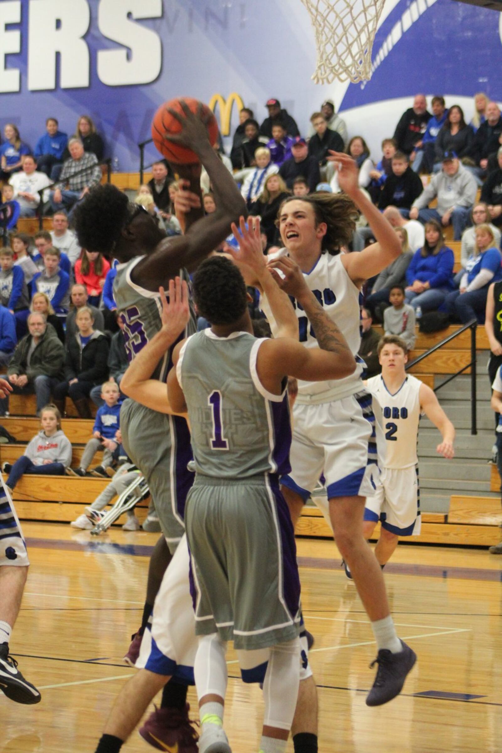 Middletown’s Jomar Bailey (35) works his way toward the basket with teammate Nelson Rutledge on Saturday night at Springboro. That’s the Panthers’ Zac Lavin (10) on defense. CONTRIBUTED PHOTO BY MARITZA MCKINNEY