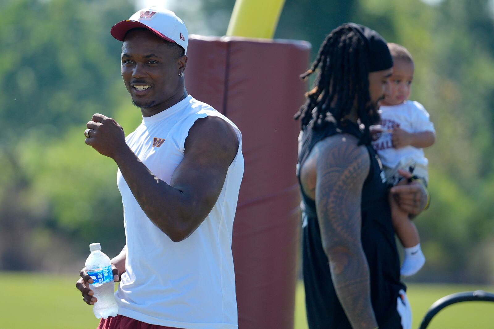 Washington Commanders wide receiver Terry McLaurin walks across the field after a practice at the team's NFL football training camp, Sunday, July 27, 2025, in Ashburn, Va. (AP Photo/Mark Schiefelbein)