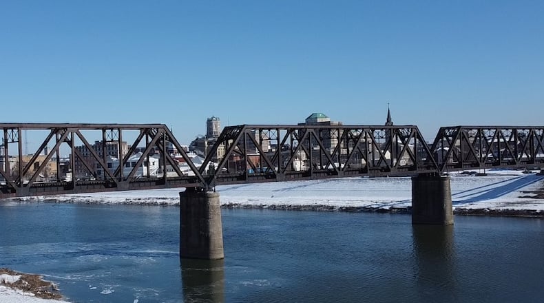 The replacement permanent bridge, which stands today, was built in late 1913 and opened to traffic in 1914. The temporary wooden bridge was then removed. Photo courtesy of Jim Krause