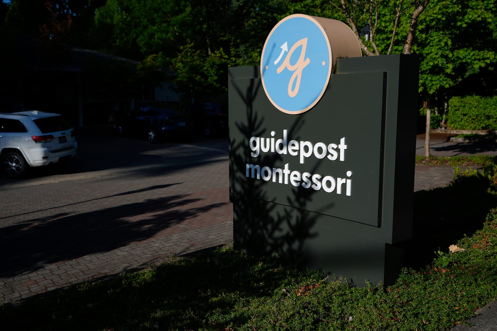 A sign for the Guidepost Montessori school is seen Friday, July 18, 2025, in Beaverton, Ore. (AP Photo/Jenny Kane)