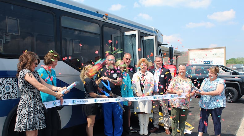 Fairfield officials joined Debbie Bernges and her husband Brad Howard for their Hicks Boulevard businesses, Integrative WellCare and Retreat Mobile IV Hydration. Credit: Sue Kiesewetter