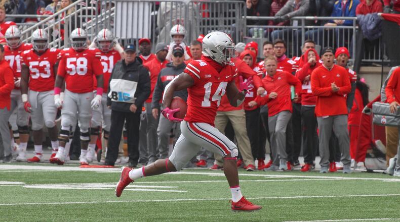 Ohio State’s K.J. Hill scores a touchdown after a catch against Minnesota on Saturday, Oct. 13, 2018, at Ohio Stadium in Columbus. David Jablonski/Staff