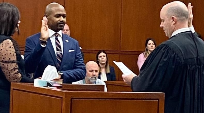 Breighton Smith is sworn in as Warren County Clerk of Courts Dec. 17, 2024, by Ohio Supreme Court Justice Dan Hawkins. CONTRIBUTED