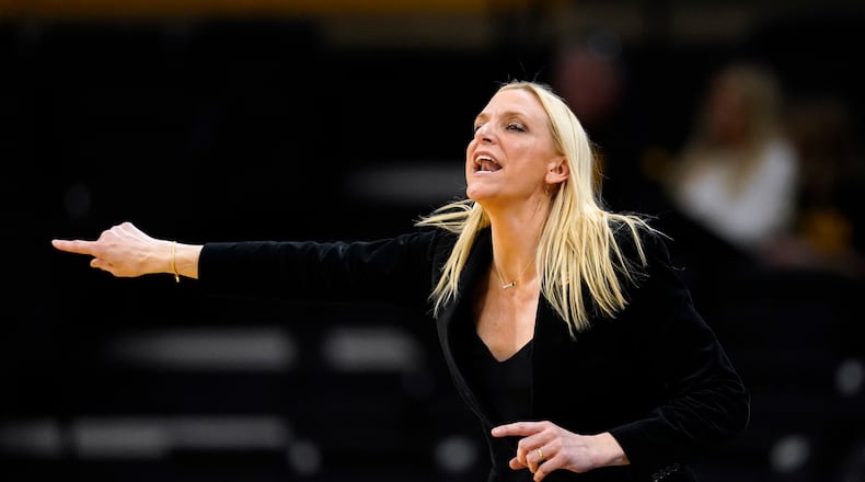 Florida State head coach Brooke Wyckoff directs her team in the first half of a first-round college basketball game against Georgia in the NCAA Tournament, Friday, March 17, 2023, in Iowa City, Iowa. (AP Photo/Charlie Neibergall)