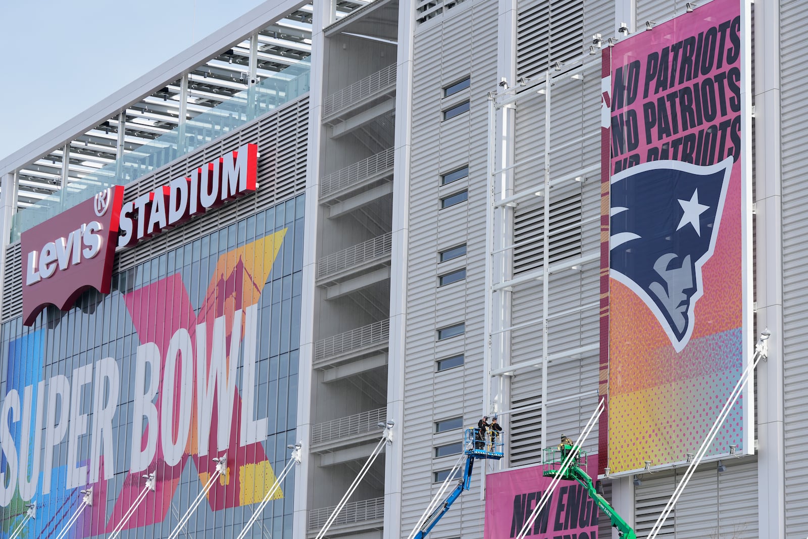 Workers get Levi's Stadium ready for Super Bowl LX between the Seattle Seahawks and the New England Patriots in Santa Clara, Calif., Saturday, Jan. 31, 2026. (AP Photo/Godofredo A. Vásquez)