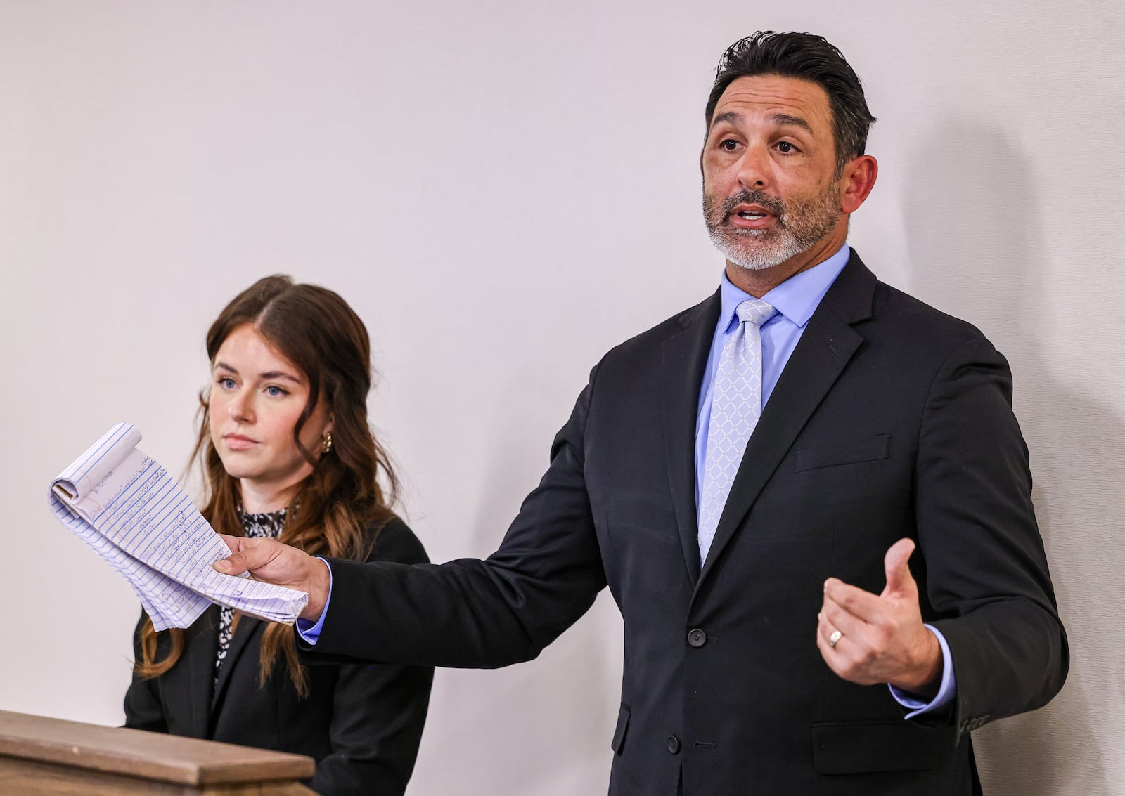 Dustin Herman, a partner at Spangenberg Shibley & Liber, speaks while Caroline Newsome, attorney at Newsome Law, listens during a news conference on Tuesday, Feb. 3 in Dayton. A new civil lawsuit alleges officials in the United Methodist Church of Ohio hired a former cult member as a music director and failed to act after being warned the employee was sexually abusing a minor, allowing the alleged abuse to continue. The complaint was brought on behalf of two survivors. BRYANT BILLING / STAFF