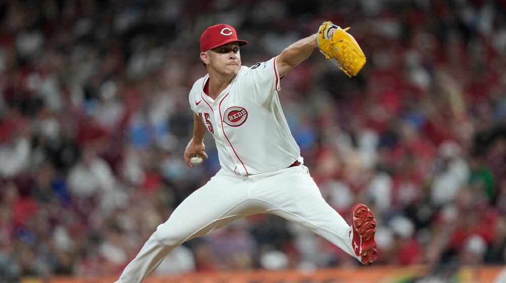 Cincinnati Reds pitcher Emilio Pagán throws during the ninth inning of a baseball game against the Los Angeles Dodgers, Tuesday, July 29, 2025, in Cincinnati. (AP Photo/Carolyn Kaster)
