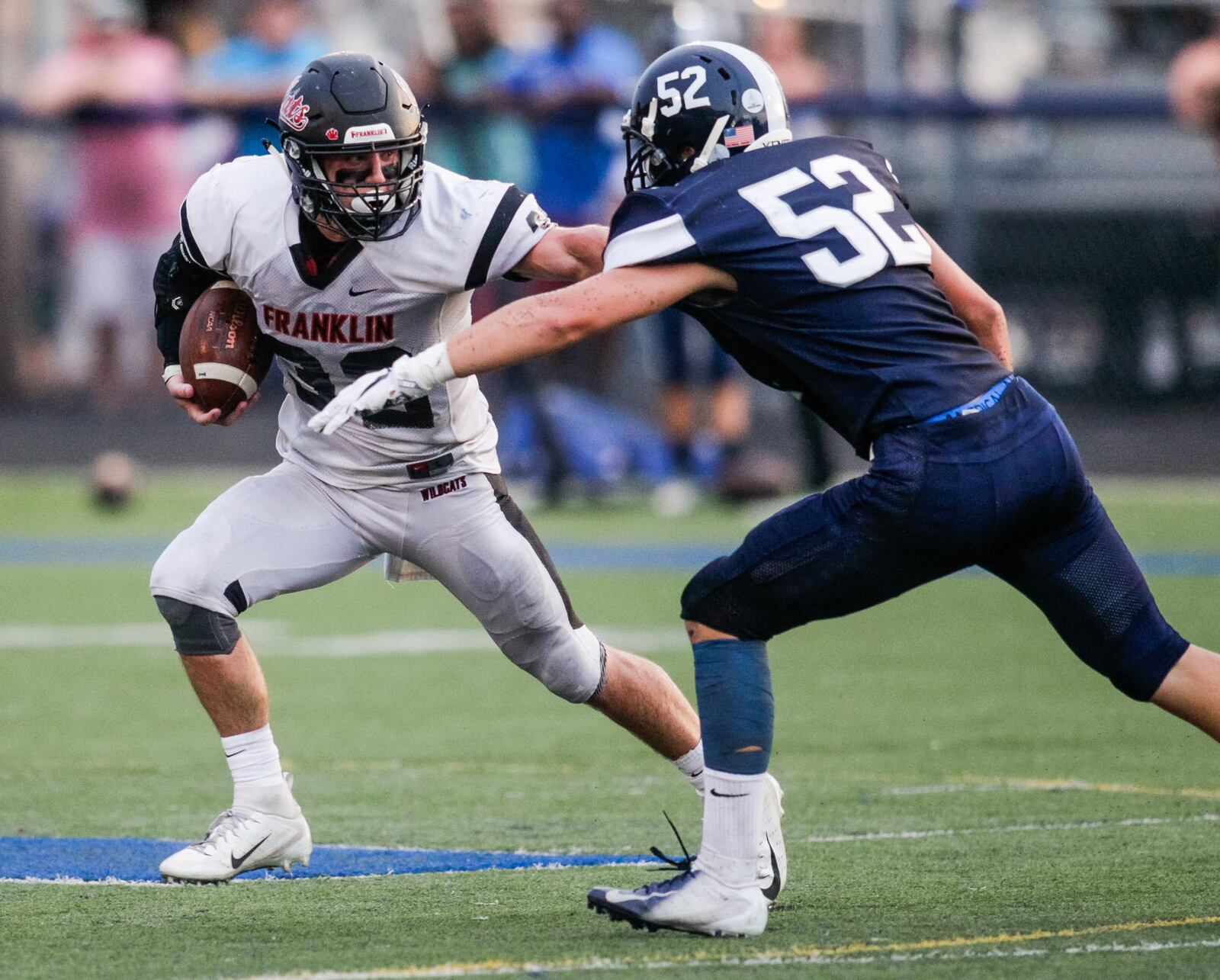 Edgewood’s Tyler Began (52) goes after Franklin running back Matt Centers during Friday night’s game at Kumler Field in St. Clair Township. NICK GRAHAM/STAFF