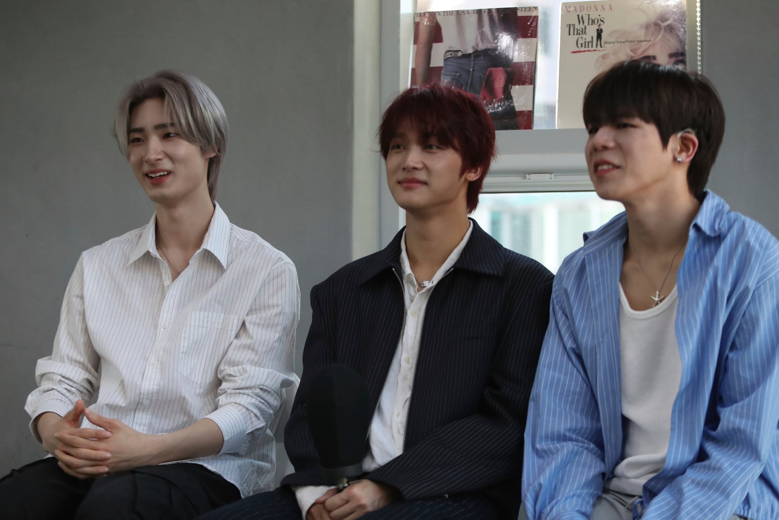 Members of K-pop band Big Ocean, from left to right, Jiseok, PJ and Chanyeon, participate in an interview with The Associated Press in Seoul, South Korea, April 15, 2025. (AP Photo/Juwon Park)