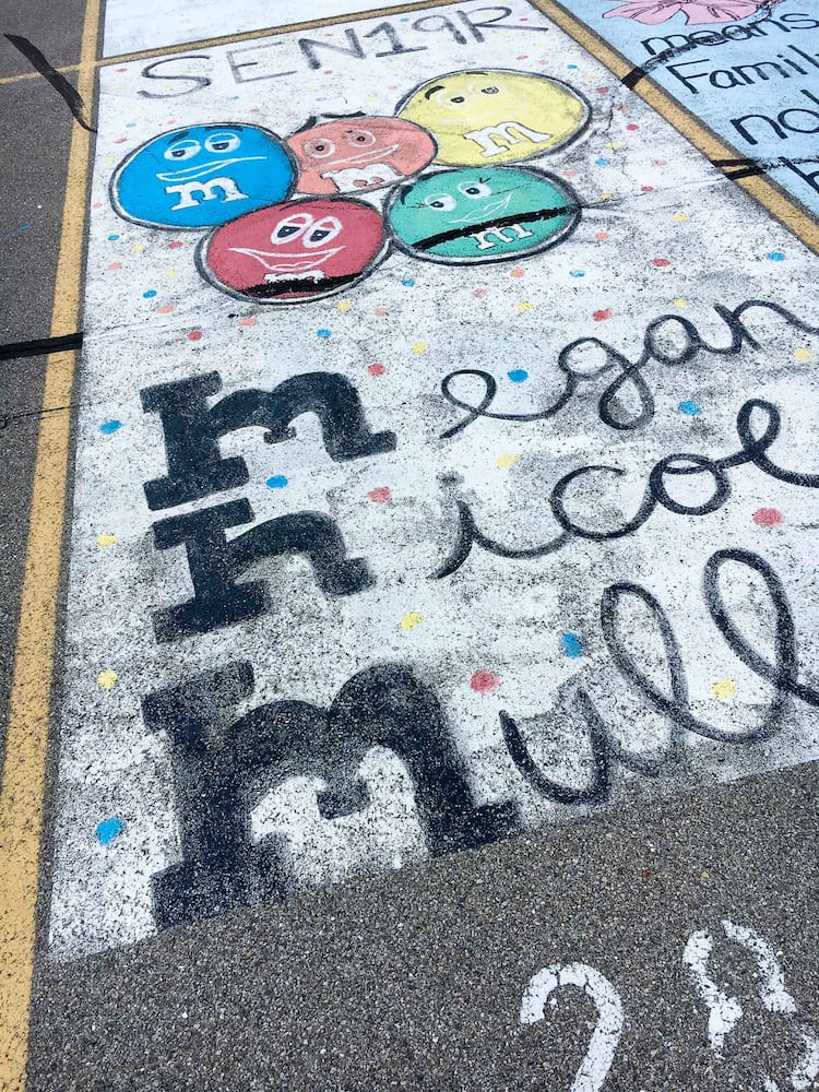 PHOTOS Lakota East seniors paint parking spots