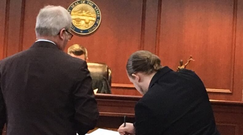 Trevor Fraley, right, with his attorney Chris Pagan, in Butler County Common Pleas Court. LAUREN PACK/STAFF